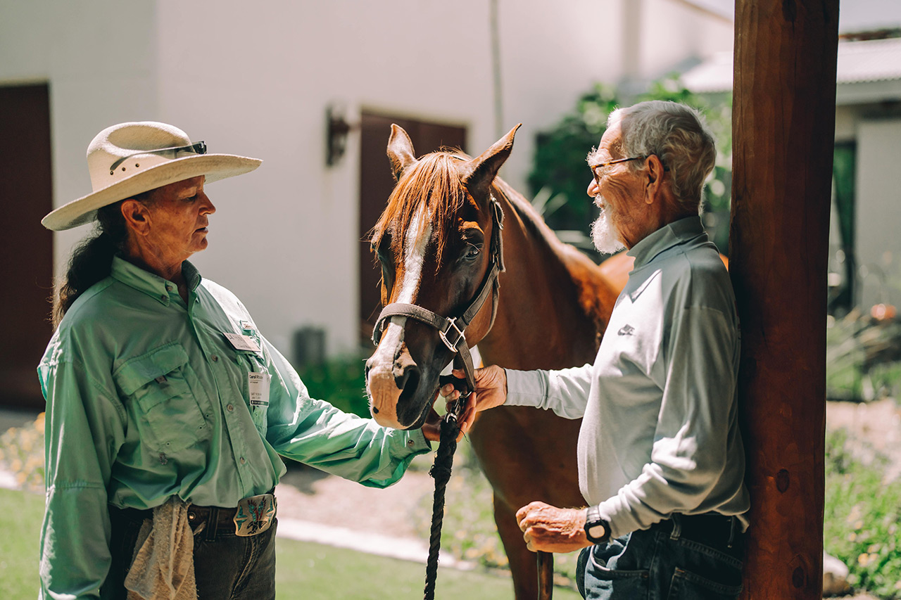 Residents with a horse.