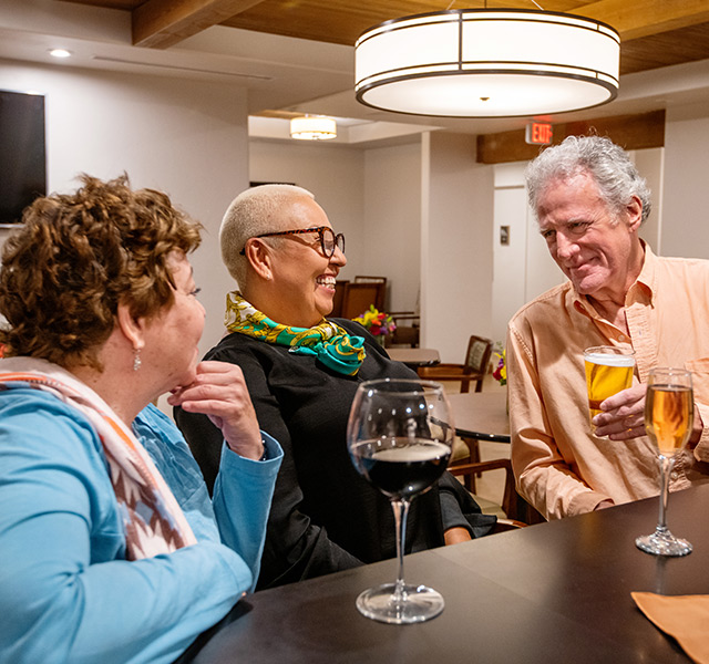Residents with drinks at the Gallery Bar and Cafe.