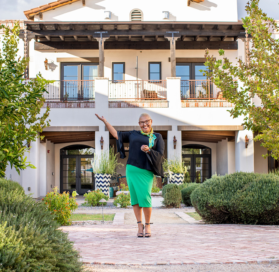 A resident at The Hacienda at the River entrance.