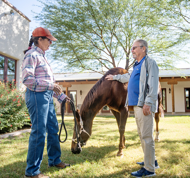 Residents with a horse.