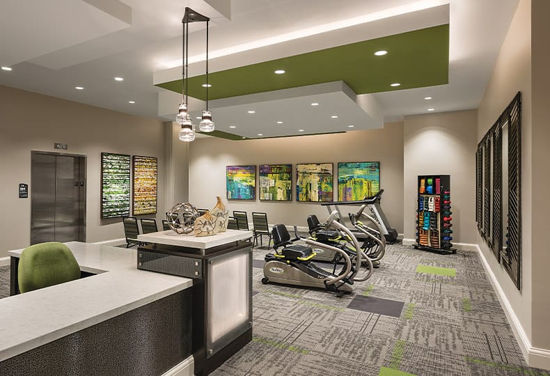 First floor wellness room feature free weights and cardio equipment