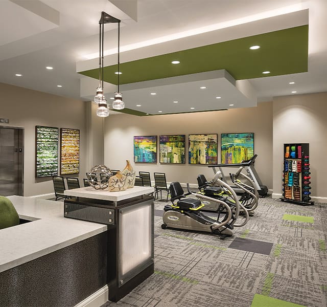 First floor wellness room feature free weights and cardio equipment