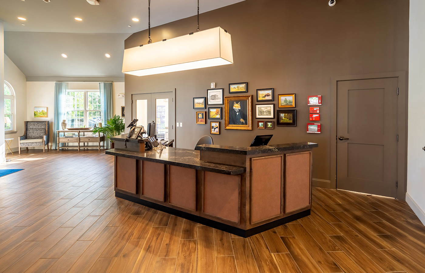 A lobby with a front desk.