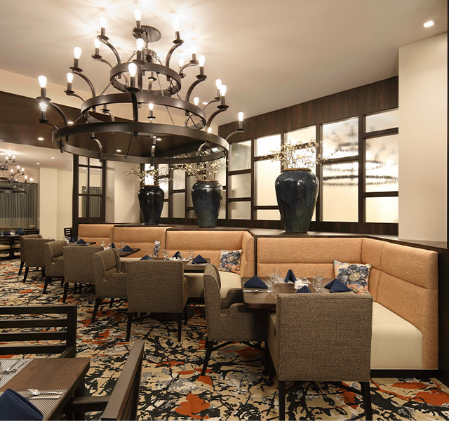 A dining room set for service.