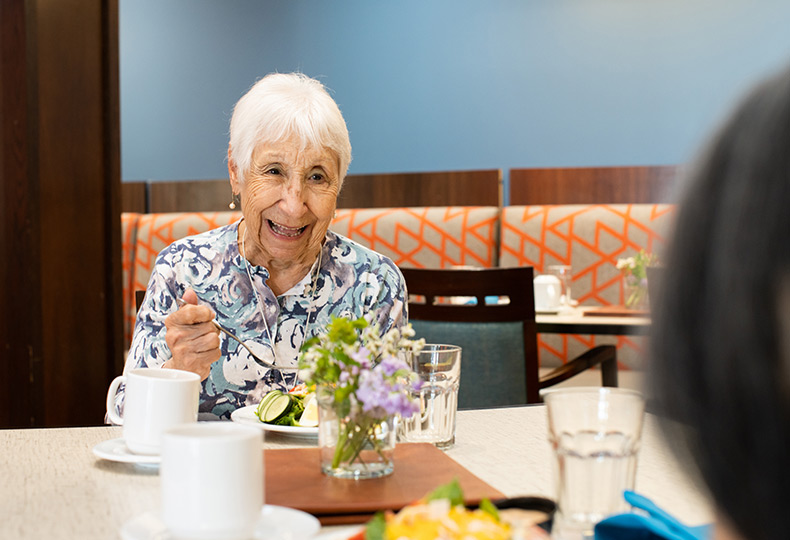 A resident eating lunch.