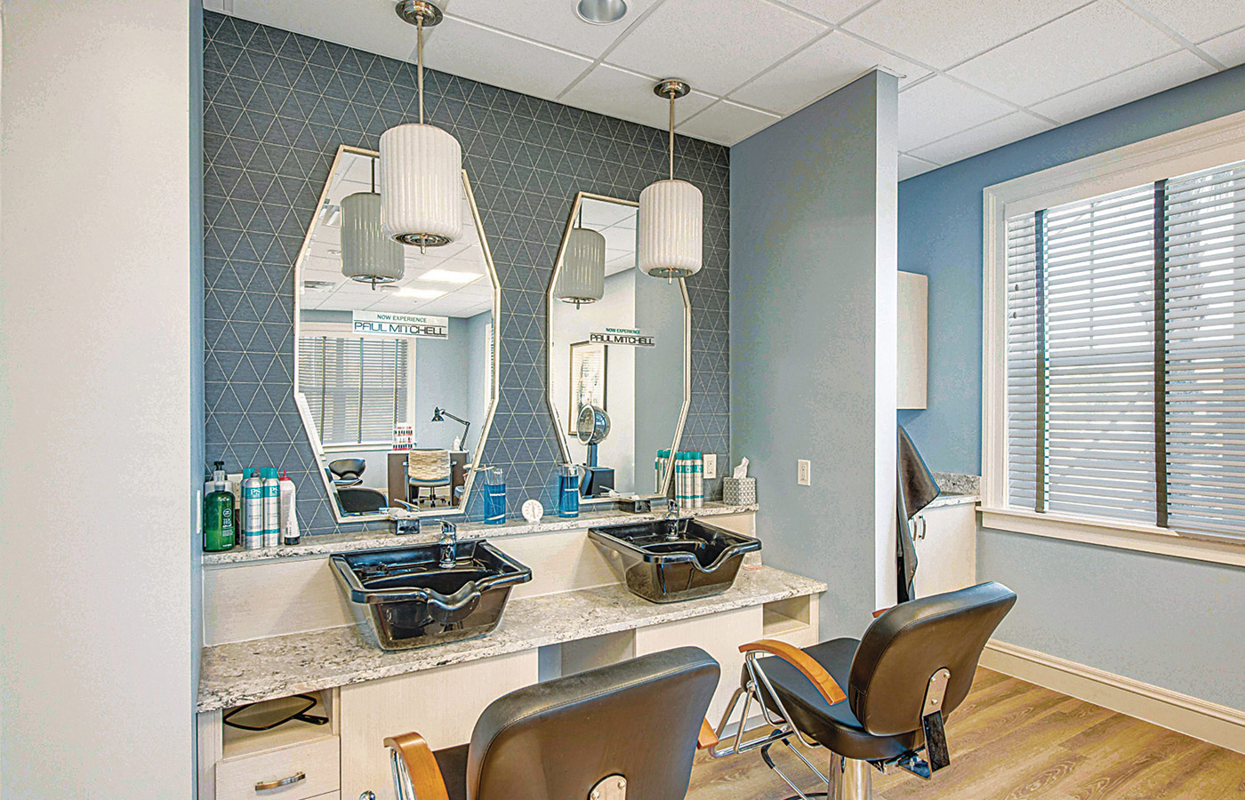 Salon with hair styling stations.