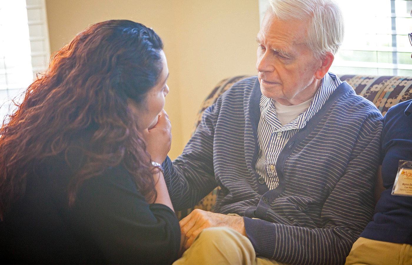 A resident and his caregiver.
