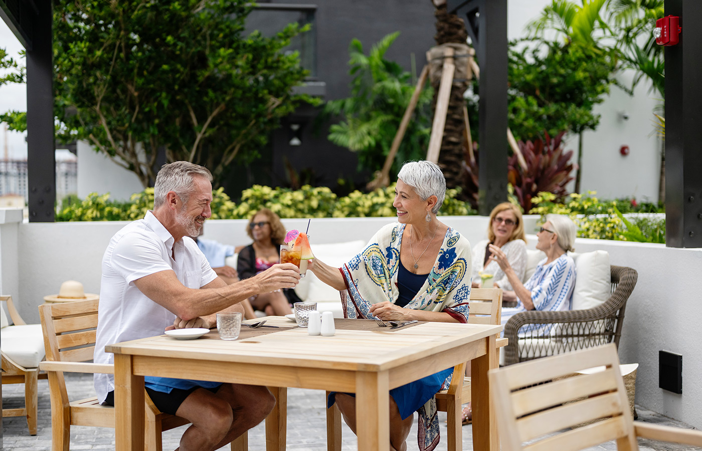 A group of people dining outside.