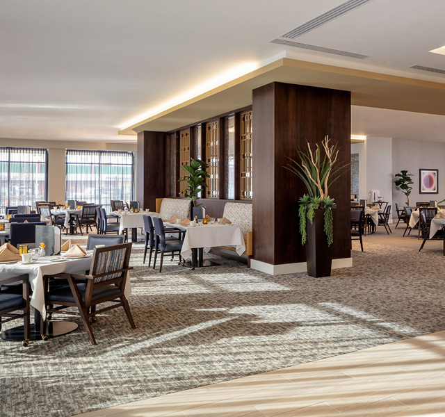 The formal dining room set for dinner.