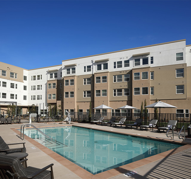 A pool next to the building.