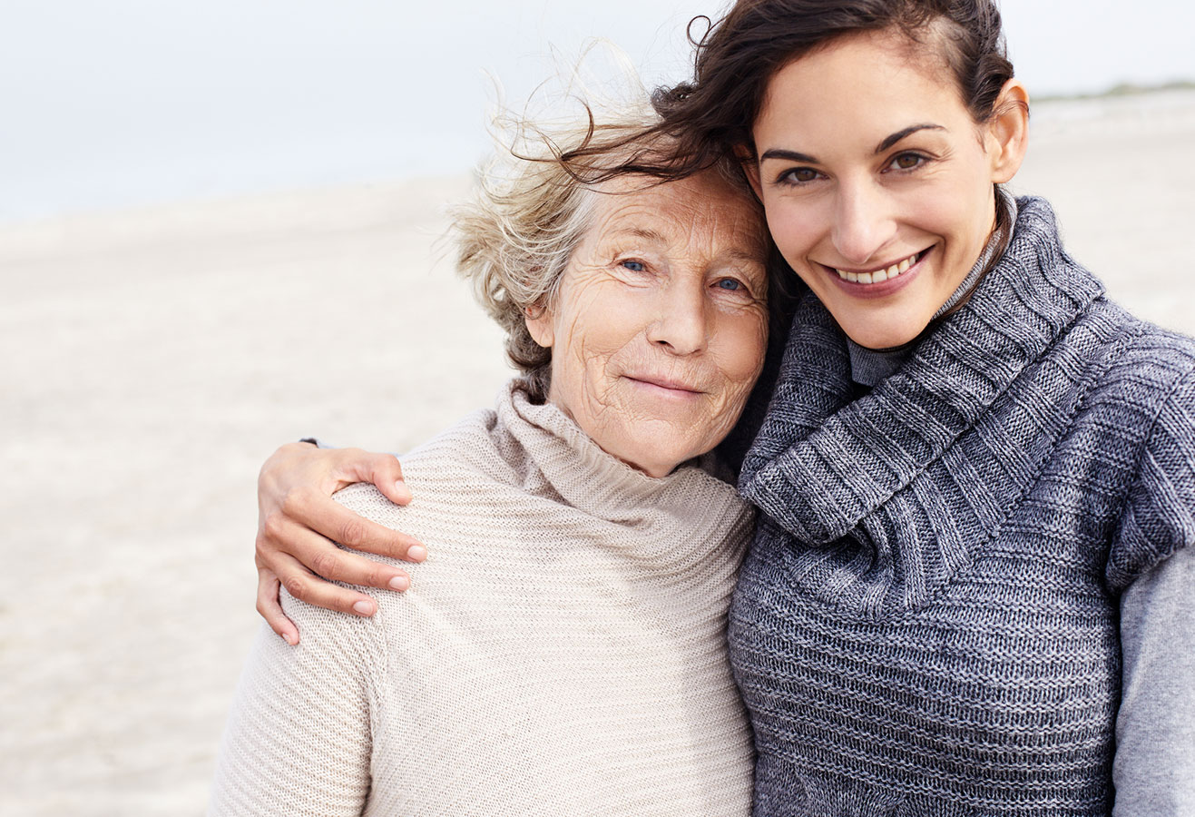 An adult child with their parent.