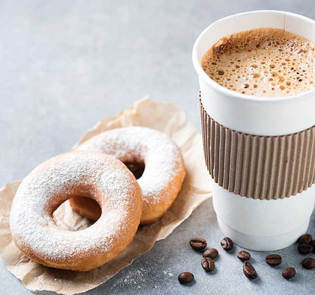 Donuts and a cup of coffee.