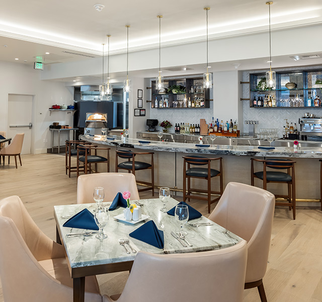 A dining room with tables.