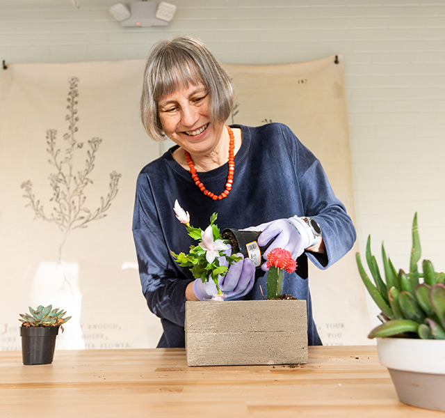 A person working in a greenhouse.
