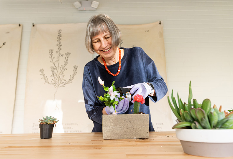 A person working in a greenhouse.