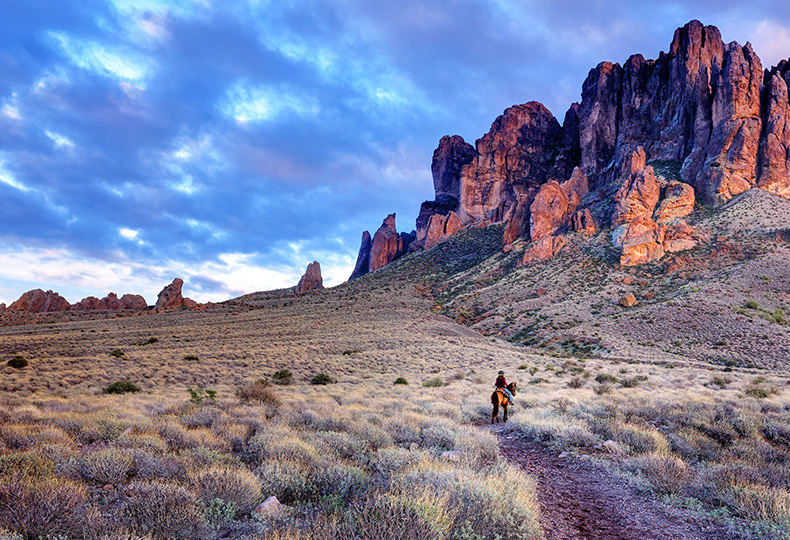 Desert trail by a canyon.