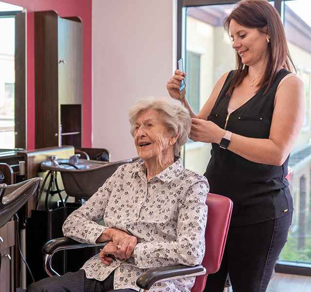 Resident getting hair done at the salon.