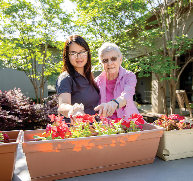 Two people in the garden.