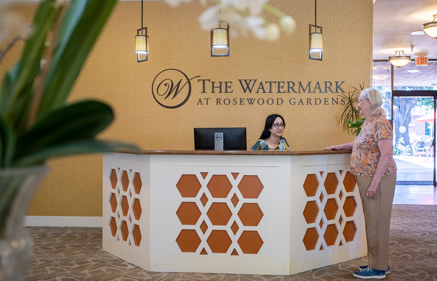 People at a front desk.