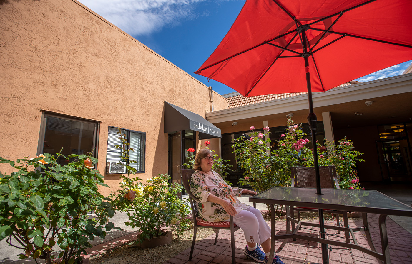 A person sitting on the patio.