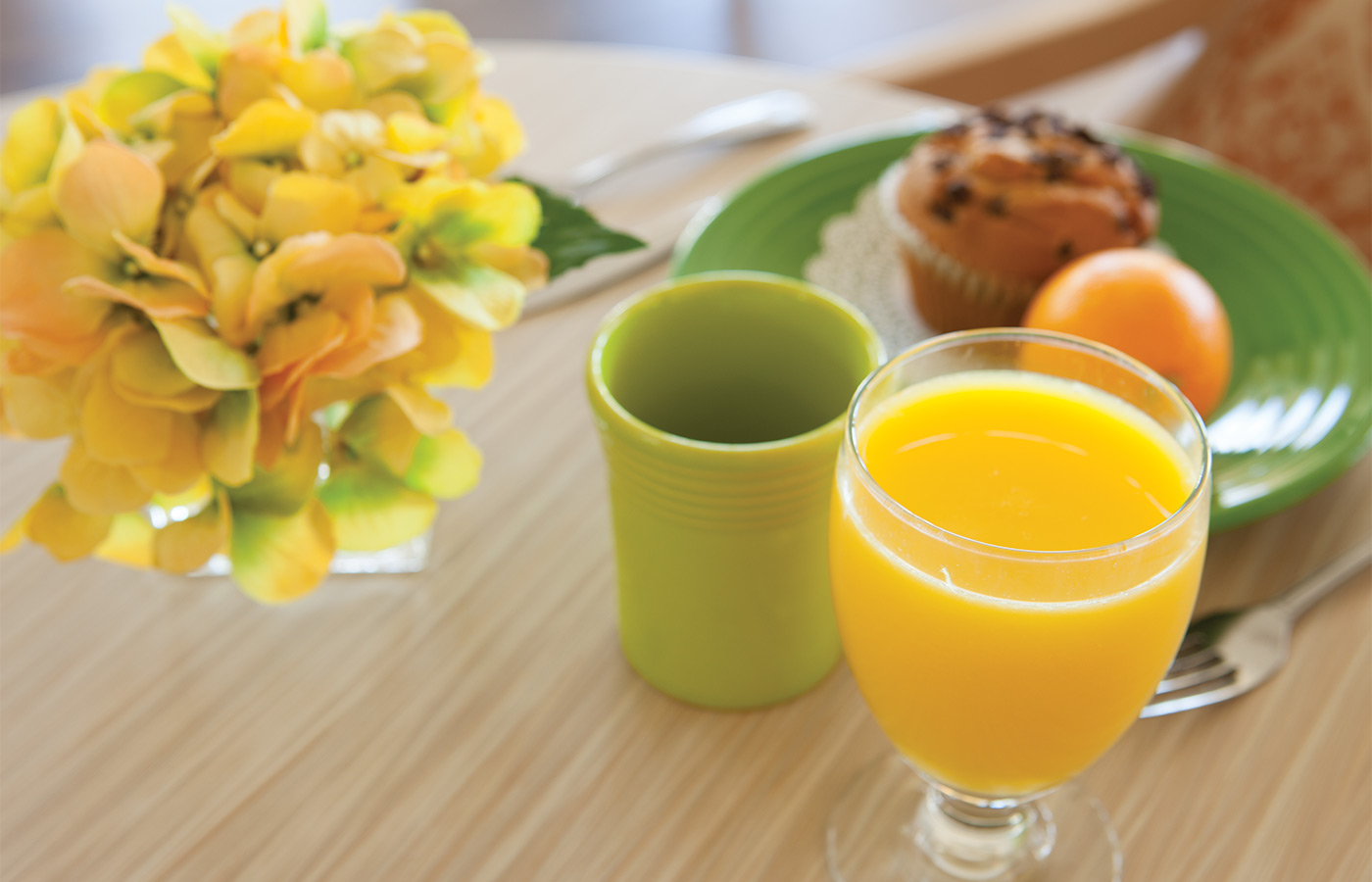 Juice and coffee on a table.
