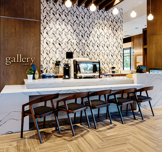 A cafe counter with seating.