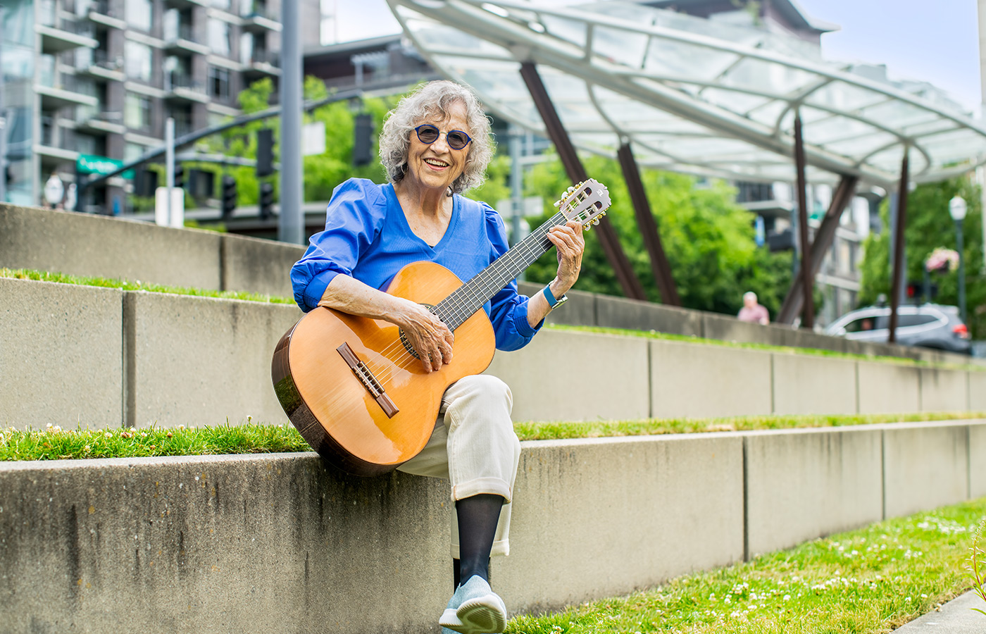 A person playing a guitar.