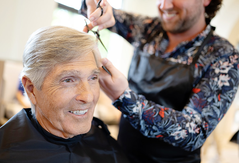 A person getting their hair cut.