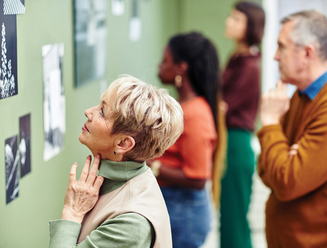 Residents enjoying art at a museum.