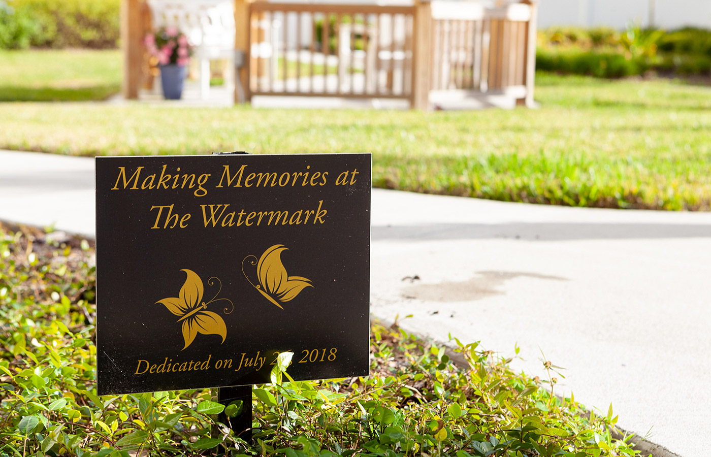 close up of small making memories at Watermark sign outside 