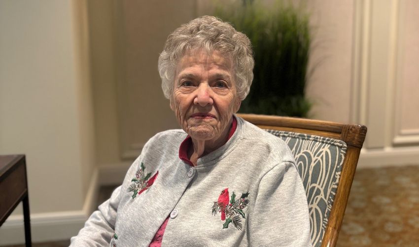 A person sitting in a chair.