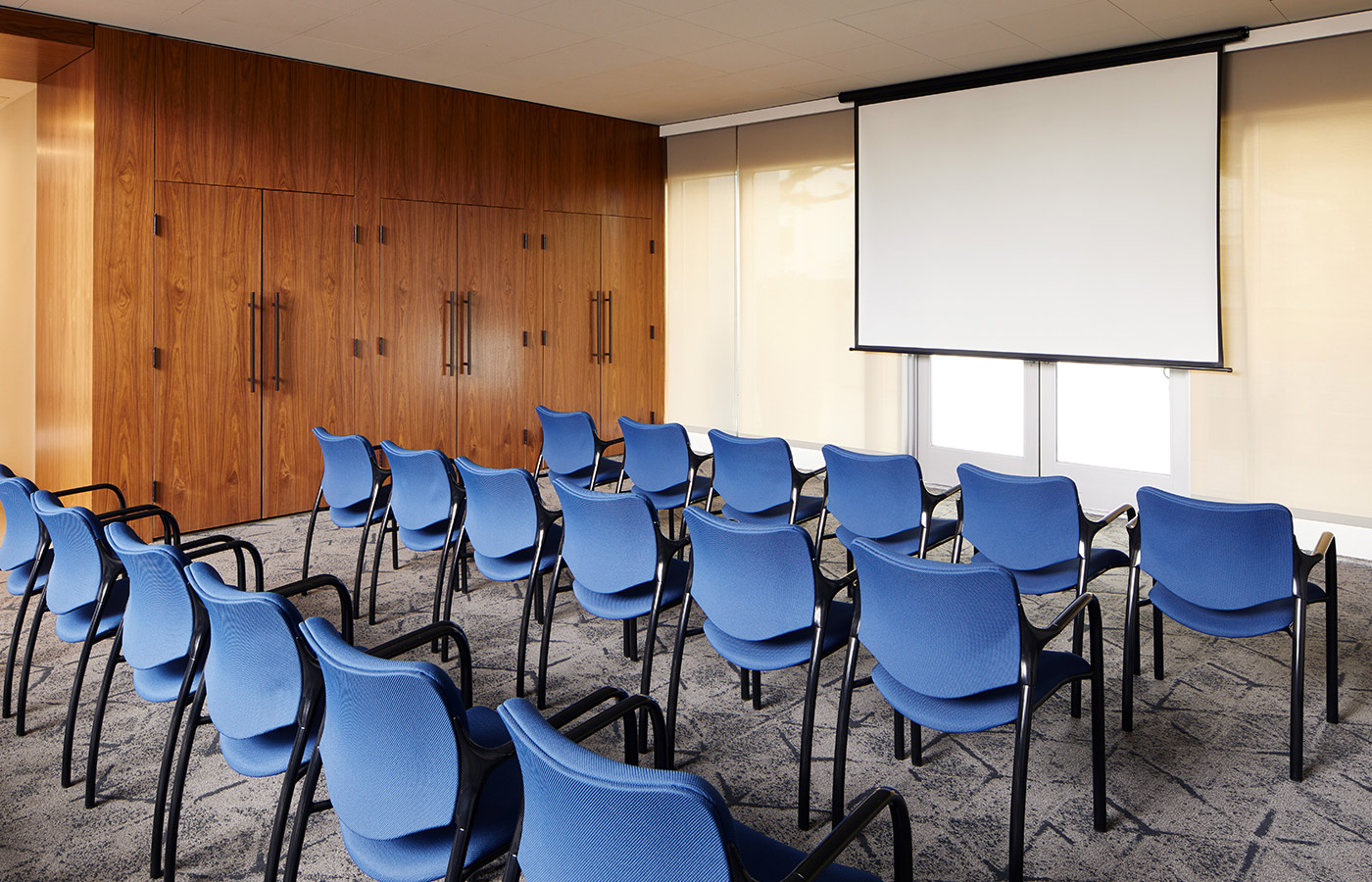 lined up seating facing projector screen