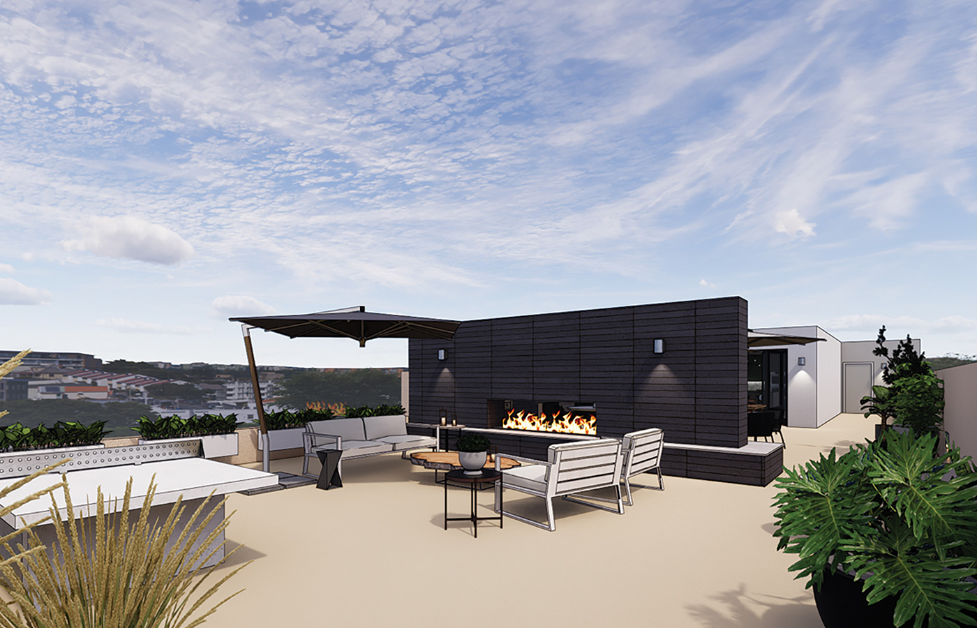 Rooftop area with seating and a fireplace.