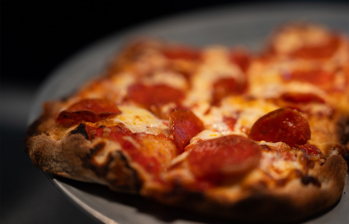 Pizza with pepperoni.