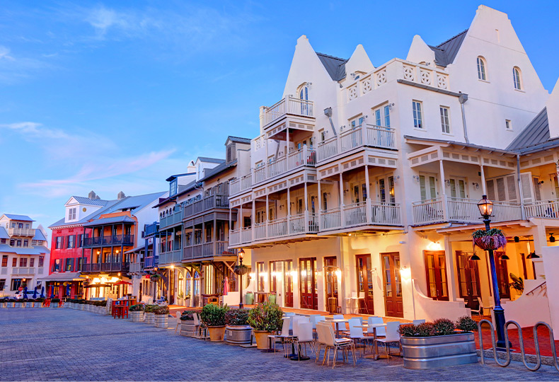 A city street lit up at night.