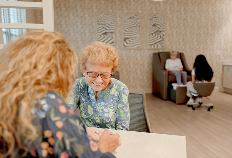 A person getting their nail painted.