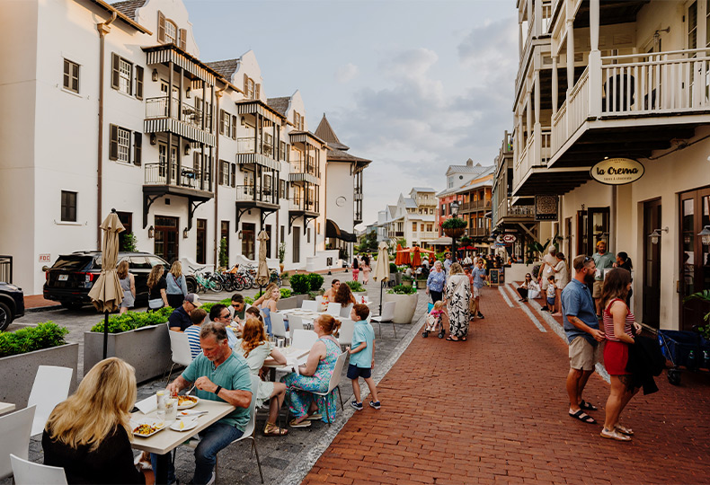 A town with people walking around.