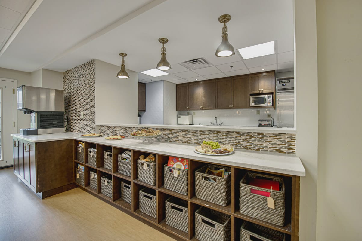 A cafe area with storage shelves.