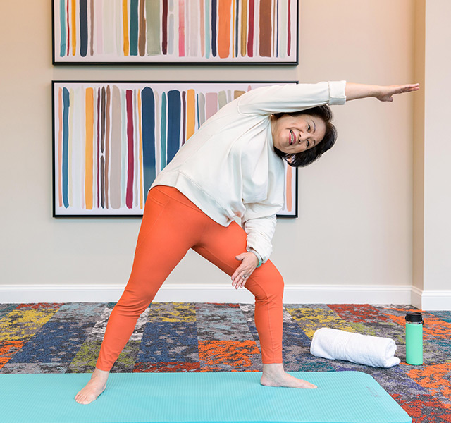 Resident enjoying yoga.