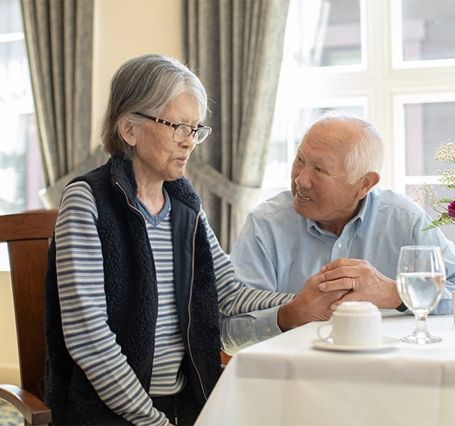 Residents enjoying a meal.