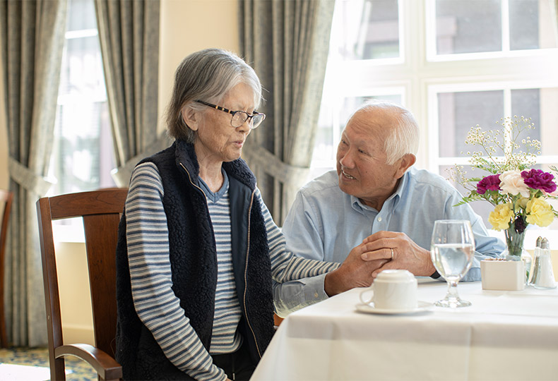 Residents enjoying a meal.