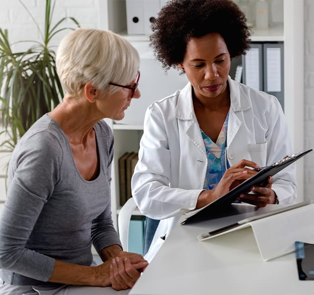 A resident with their caregiver.