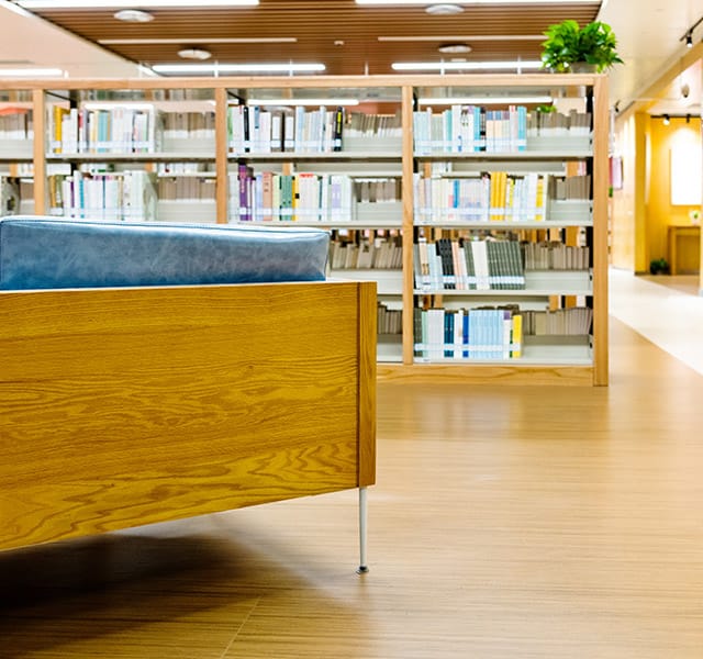 Public Library with shelves filled with books.