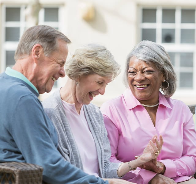 Residents laughing and chatting.