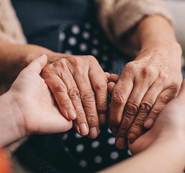 People holding hands.