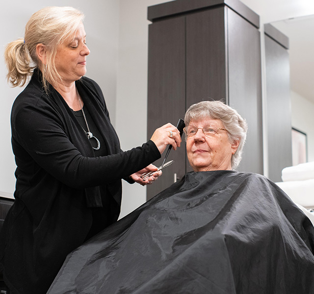 Resident getting hair done at the salon.