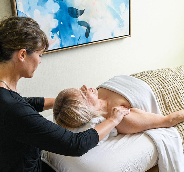 Resident enjoying a massage.