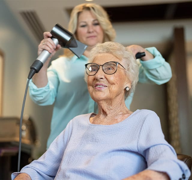 Resident getting hair done at the salon.