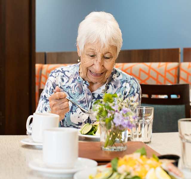 Residents enjoying lunch.