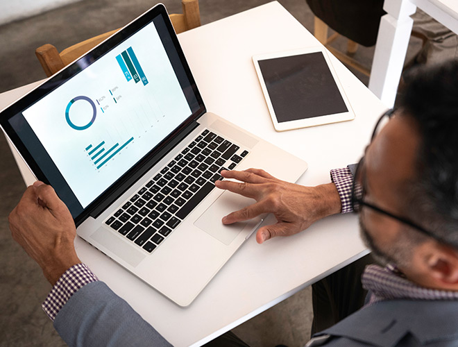 A person is working on their laptop.